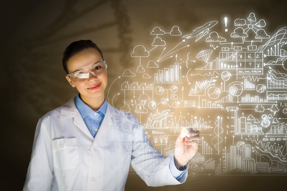 Young woman researcher in medical uniform drawing chemistry formulas Young woman researcher in medical uniform drawing chemistry formulas